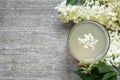 Elderberry flower drink over white wooden background. healthy herbal drink Royalty Free Stock Photo