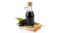 Elderberry syrup in a bottle, front view of ready to take-in syrup ripe elderberries. generative ai