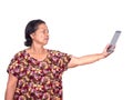 Elderly asian woman holding digital tablet and stretch out forw Royalty Free Stock Photo