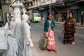 Elderly asian women stand on street