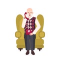 Elderly bearded man sitting in comfortable armchair and talking on phone. Portrait of grandfather at home. Smiling male Royalty Free Stock Photo