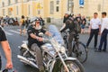 An elderly biker with a beard.