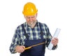 Elderly builder holding utensils