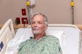 Elderly Man in Hospital Bed Royalty Free Stock Photo