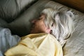 Elderly caucasian senior woman sleeping