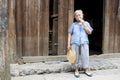 Elderly Chinese Lady Eating Cucumber Royalty Free Stock Photo