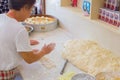 Elderly Chinese woman preparing baozi