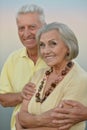 Elderly couple on the background of sky Royalty Free Stock Photo