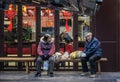 Elderly couple buying food on the street