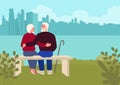 Elderly couple embracing on a city park bench, gazing at the serene city shore Royalty Free Stock Photo