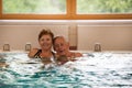 Elderly couple in pool Royalty Free Stock Photo