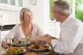 Elderly Couple Enjoying meal,mealtime Together Royalty Free Stock Photo