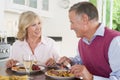 Elderly Couple Enjoying meal, mealtime Together Royalty Free Stock Photo