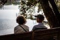 An Elderly Couple Enjoying a Sunrise Together