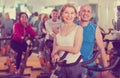 Elderly couple exercising in gym Royalty Free Stock Photo