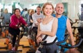 Elderly couple exercising in gym Royalty Free Stock Photo