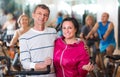 Elderly couple exercising in gym Royalty Free Stock Photo