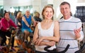 Elderly couple exercising in gym Royalty Free Stock Photo