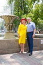 Elderly couple gently looking at each other