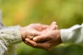 Elderly couple holding hands Royalty Free Stock Photo