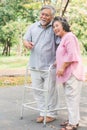 elderly couple with lifestyle after retiree concept. Lovely asian seniors couple walking exercise in the park in the morning Royalty Free Stock Photo