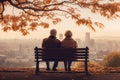 an elderly couple, a man and a woman, are sitting on a bench and enjoying the scenery, beautiful landscape at sunset, rear Royalty Free Stock Photo