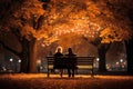 an elderly couple, a man and a woman, are sitting on a bench and enjoying the scenery, beautiful landscape at sunset, rear Royalty Free Stock Photo