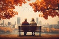 an elderly couple, a man and a woman, are sitting on a bench and enjoying the scenery, beautiful landscape at sunset, rear Royalty Free Stock Photo