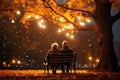 an elderly couple, a man and a woman, are sitting on a bench and enjoying the scenery, beautiful landscape at sunset, rear Royalty Free Stock Photo