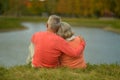 Elderly couple near lake