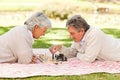 Elderly couple playing chess Royalty Free Stock Photo