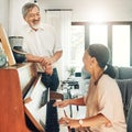 Elderly couple playing piano for music in living room for bonding, entertainment or having fun. Happy, smile and senior Royalty Free Stock Photo