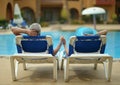 Elderly couple at pool Royalty Free Stock Photo