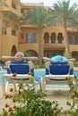 Elderly couple at pool Royalty Free Stock Photo