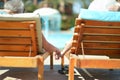 Elderly couple at pool Royalty Free Stock Photo