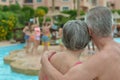 Elderly couple at pool Royalty Free Stock Photo
