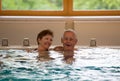 Elderly couple in pool Royalty Free Stock Photo