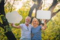 Elderly couple enjoying in garden at sunset. Concept couple elder love Royalty Free Stock Photo