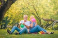 Elderly couple enjoying in garden at sunset. Concept couple elder love Royalty Free Stock Photo