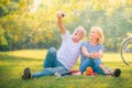 Elderly couple enjoying in garden at sunset. Concept couple elder love Royalty Free Stock Photo