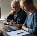 Elderly couple researching information online