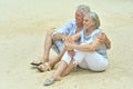 Elderly couple rest at tropical beach Royalty Free Stock Photo