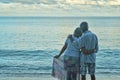 Elderly couple rest at tropical beach Royalty Free Stock Photo