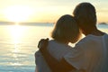 Elderly couple rest at tropical beach Royalty Free Stock Photo