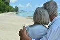 Elderly couple rest at tropical resort Royalty Free Stock Photo