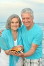 Elderly couple rest at tropical resort Royalty Free Stock Photo