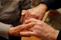 Elderly couple shaking their hands Royalty Free Stock Photo