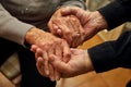 Elderly couple shaking their hands Royalty Free Stock Photo