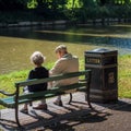 Elderly Couple Sitting on a Bench