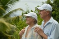 Elderly couple standing embracing Royalty Free Stock Photo